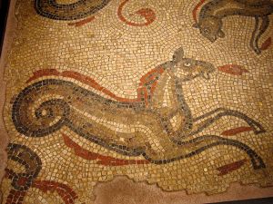 "Roman Baths, Bath - Sea Horse Mosaic". Licensed under CC BY-SA 2.0 via Wikimedia Commons.